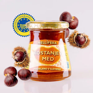 Kozarec kostanjevega medu Mellifera, ki spada v shemo SMGO, prikaz visoke kakovosti naravnega slovenskega medu.
